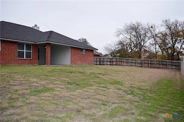 a front view of house with yard