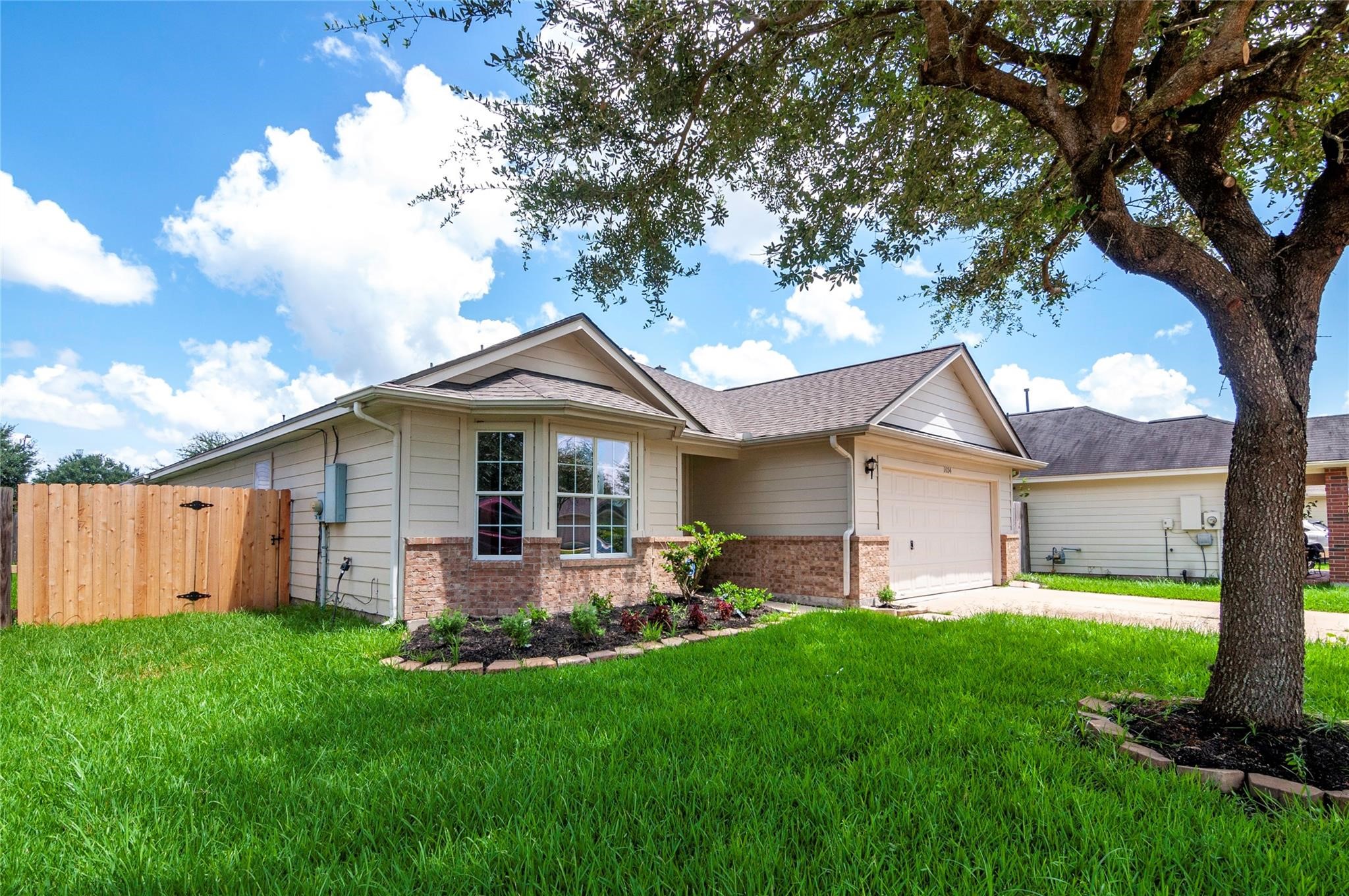 1034 Junction Court Rosenberg, TX 77471 - Photo 2 of 19 a front view of house with yard and green space