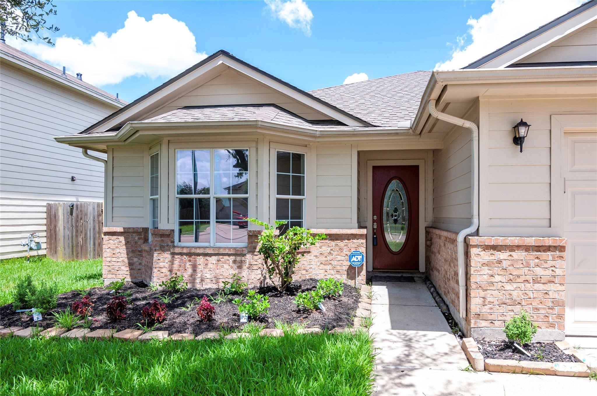 1034 Junction Court Rosenberg, TX 77471 - Photo 3 of 19 a front view of a house with a porch
