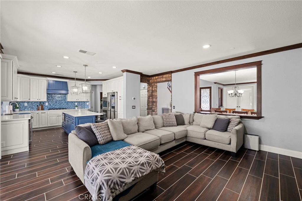 6336 Taylor Canyon Place Rancho Cucamonga, CA 91739 - Photo 14 of 60 a living room with furniture and a rug