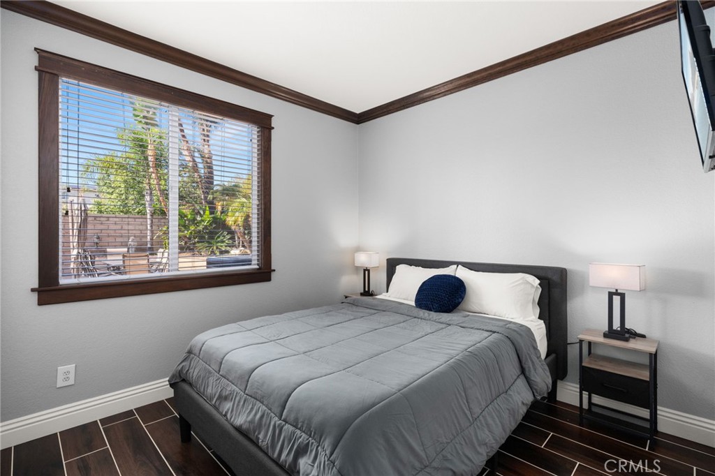 6336 Taylor Canyon Place Rancho Cucamonga, CA 91739 - Photo 23 of 60 a bedroom with a bed and a window