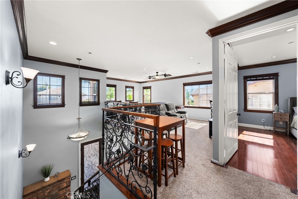 6336 Taylor Canyon Place Rancho Cucamonga, CA 91739 - Photo 27 of 60 a dining room with furniture and window