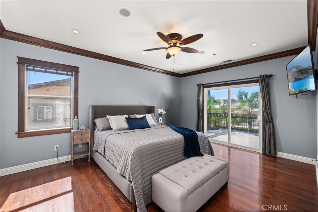 6336 Taylor Canyon Place Rancho Cucamonga, CA 91739 - Photo 30 of 60 a bedroom with a large bed and a window