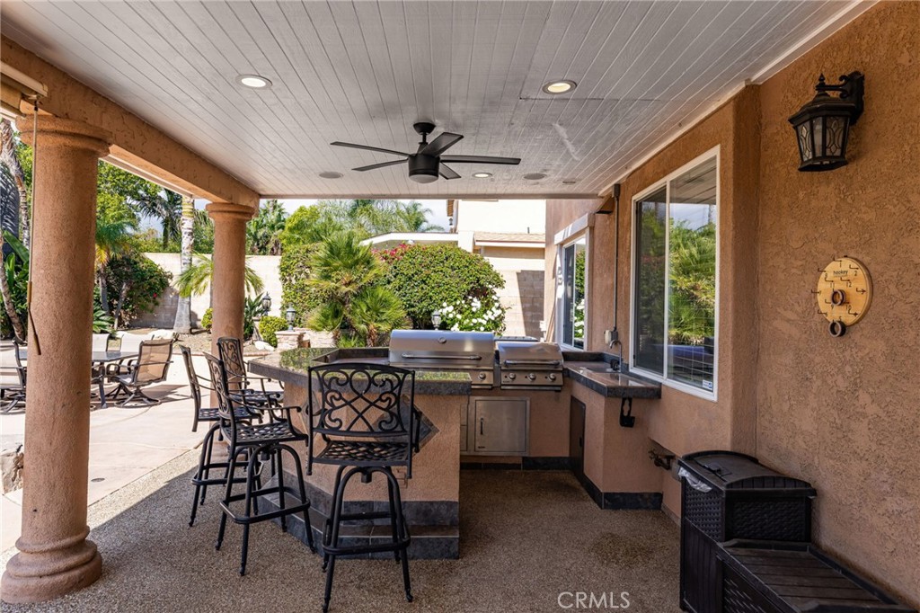 6336 Taylor Canyon Place Rancho Cucamonga, CA 91739 - Photo 44 of 60 a view of a dining room with furniture window and outside view