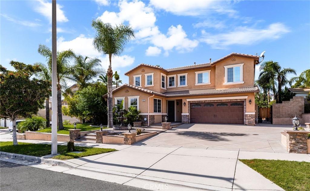 6336 Taylor Canyon Place Rancho Cucamonga, CA 91739 - Photo 5 of 60 a view of a house with outdoor space and sitting area