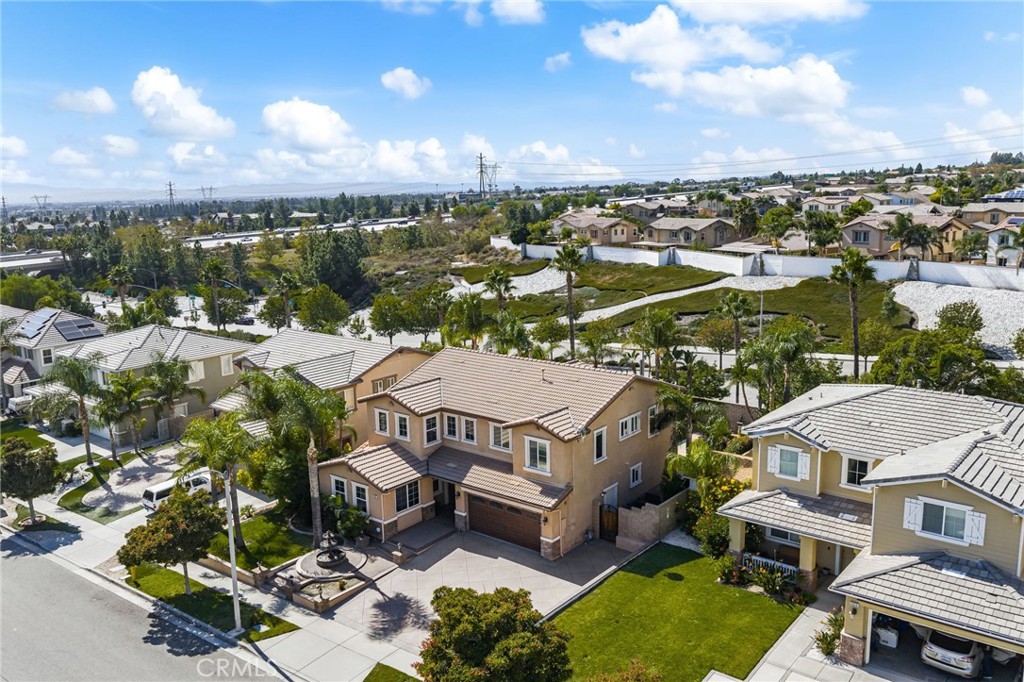 6336 Taylor Canyon Place Rancho Cucamonga, CA 91739 - Photo 56 of 60 an aerial view of residential houses with outdoor space and ocean view