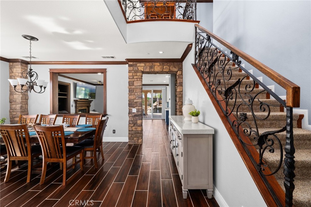 6336 Taylor Canyon Place Rancho Cucamonga, CA 91739 - Photo 8 of 60 a view of a livingroom with furniture staircase