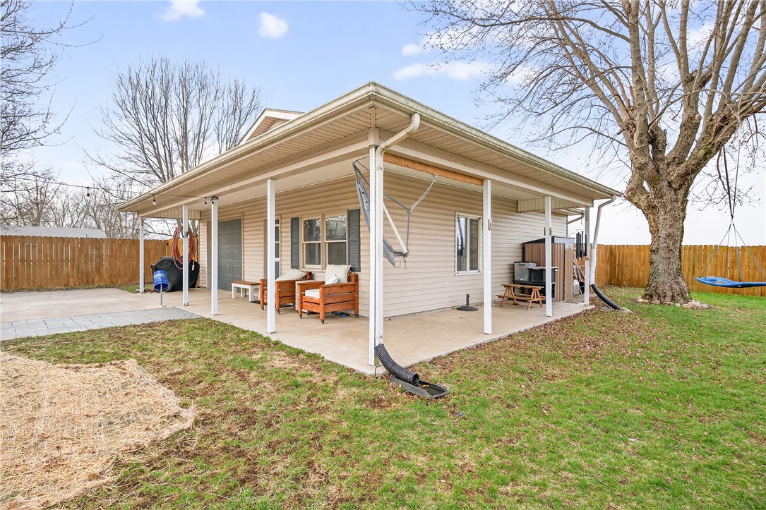 7888 Darke-Preble County Line Road Arcanum, OH 45304 - Photo 42 of 51 This charming home offers a serene outdoor retreat, perfect for enjoying quiet moments.