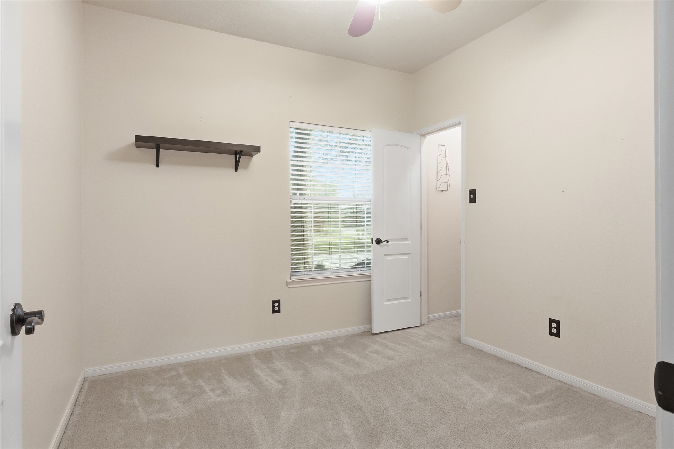 17423 Morning Star Avenue Crosby, TX 77532 - Photo 16 of 23 a view of an empty room with a window
