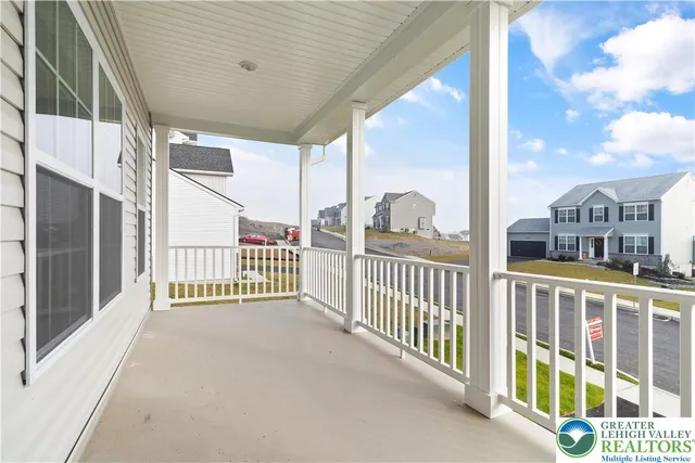 a view of a balcony with a porch