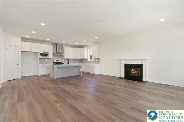 a view of kitchen with wooden floor