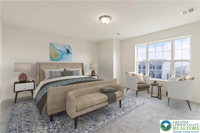 a bedroom with bed and a large window