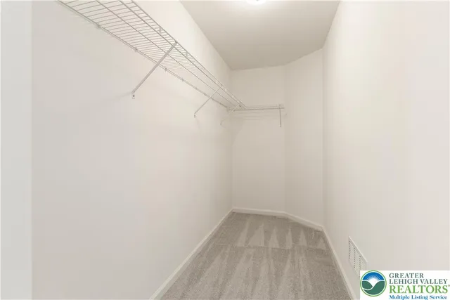 a view of a room with racks on the wall