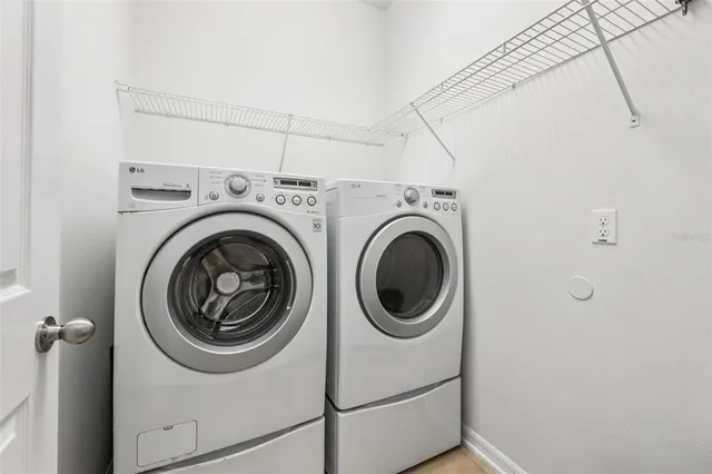 a utility room with dryer and washer
