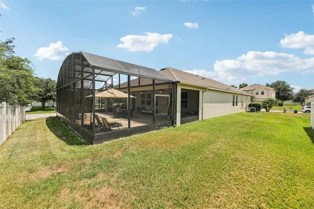 a outdoor space with lots of tables and chairs