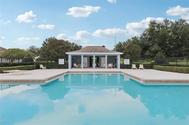 a view of a swimming pool and a terrace