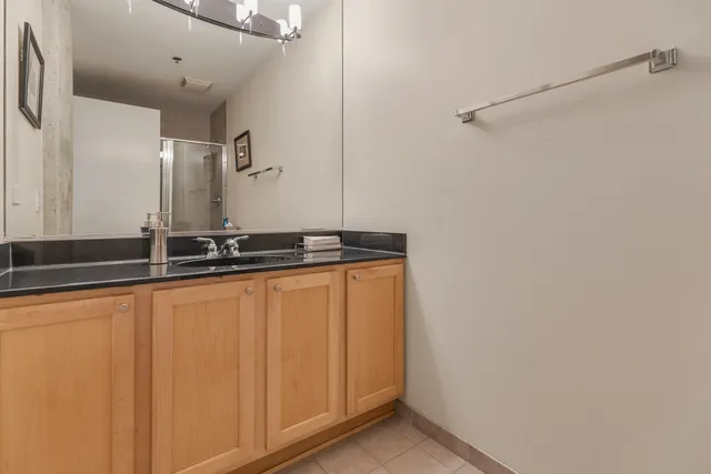 a close view of a sink and a mirror