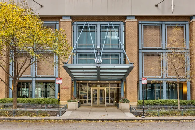 a view of a house with a iron gate