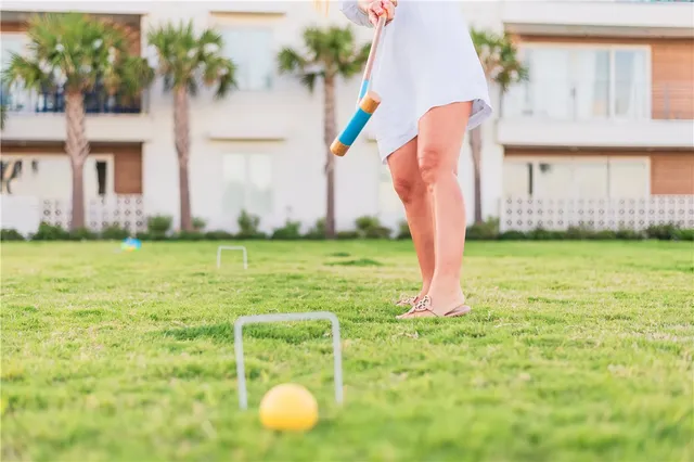 a view of a house with a yard and garage