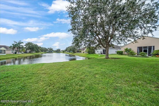 a view of a house with a big yard
