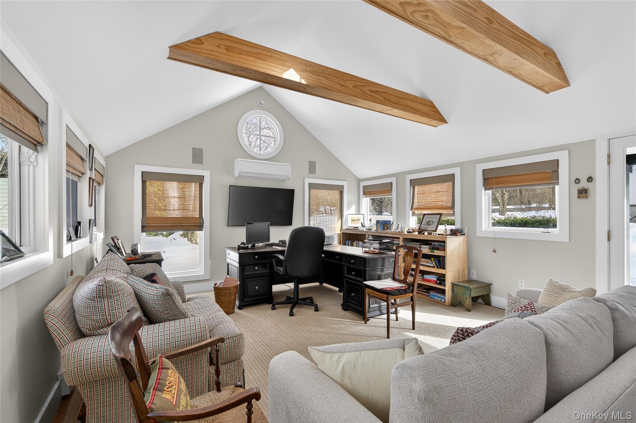 343 Chicken Valley Road Glen Head, NY 11545 - Photo 22 of 49 a living room with furniture and a large window