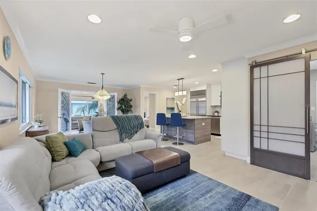 a dining room with furniture window and wooden floor