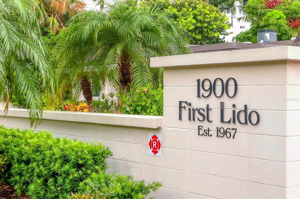 1900 Benjamin Franklin Drive, Unit V15 Sarasota, FL 34236 - Photo 25 of 39 a view of street sign