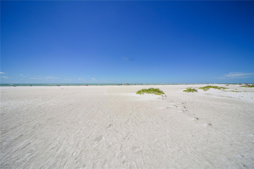 1900 Benjamin Franklin Drive, Unit V15 Sarasota, FL 34236 - Photo 31 of 39 a view of an ocean beach