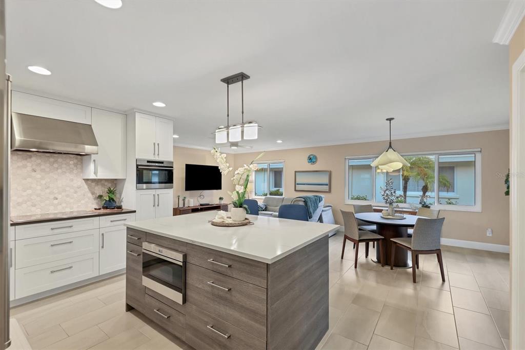1900 Benjamin Franklin Drive, Unit V15 Sarasota, FL 34236 - Photo 8 of 39 a view of kitchen and sink