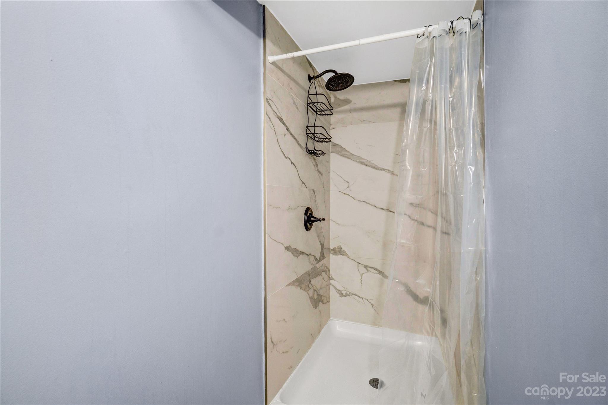 6512 Tuckaseegee Road Charlotte, NC 28214 - Photo 20 of 47 a bathroom with a shower