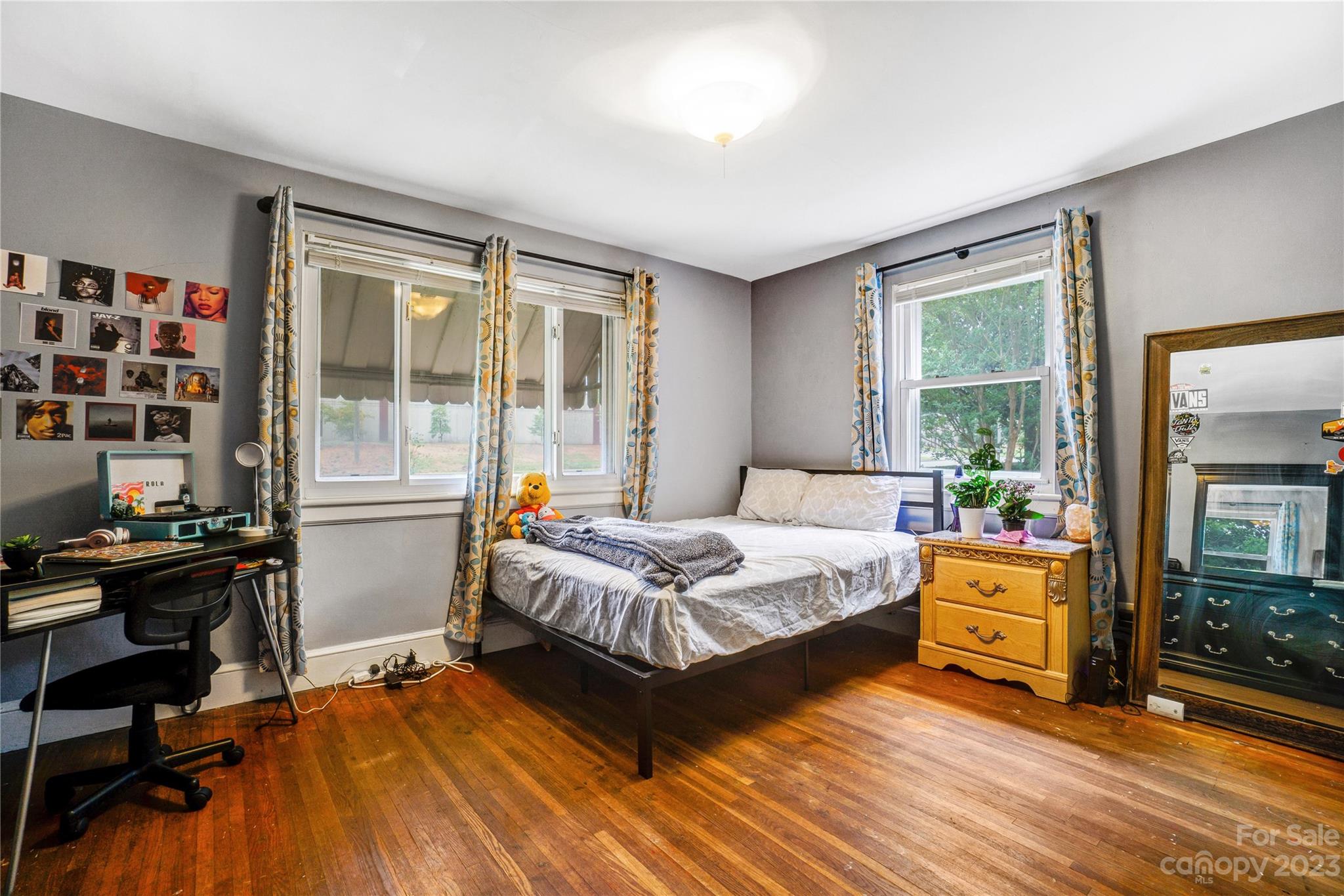 6512 Tuckaseegee Road Charlotte, NC 28214 - Photo 21 of 47 a bedroom with a bed and a large window