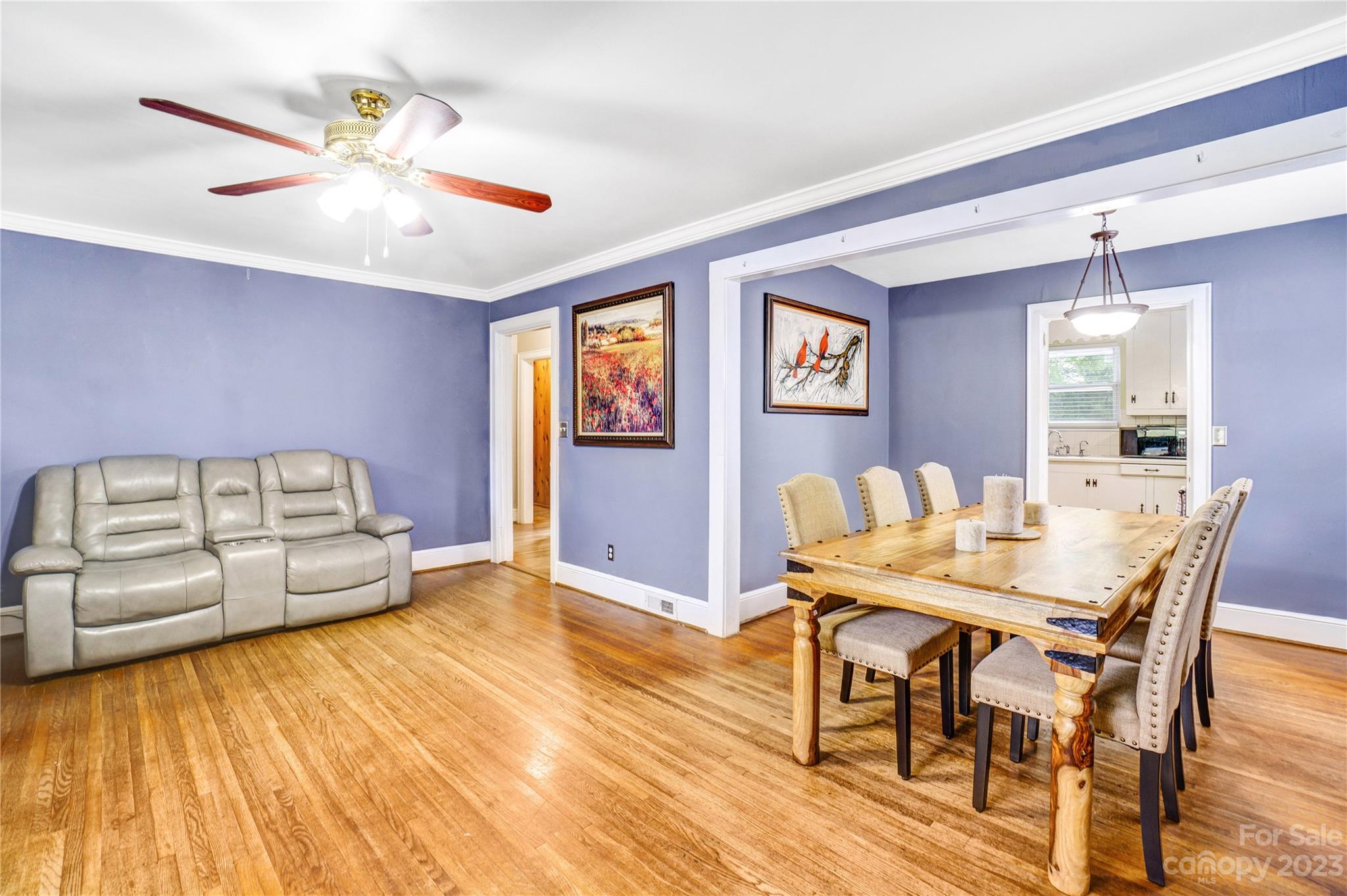 6512 Tuckaseegee Road Charlotte, NC 28214 - Photo 7 of 47 a view of a dining room with furniture and wooden floor