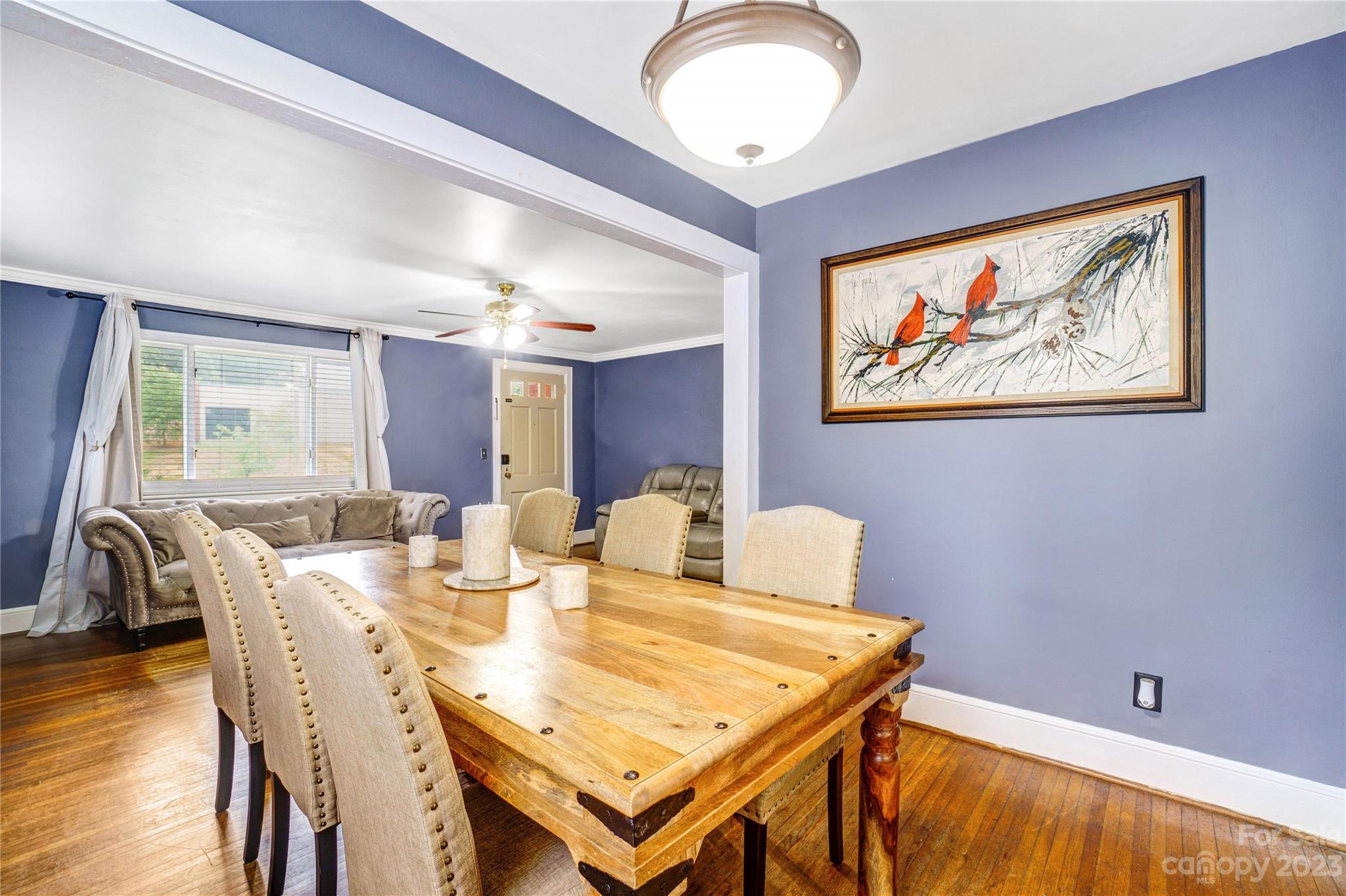 6512 Tuckaseegee Road Charlotte, NC 28214 - Photo 8 of 47 a view of a dining room with furniture and wooden floor