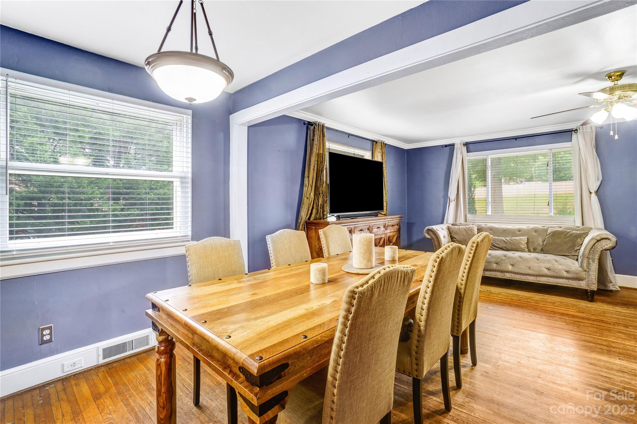 6512 Tuckaseegee Road Charlotte, NC 28214 - Photo 9 of 47 a view of a dining room with furniture window and wooden floor