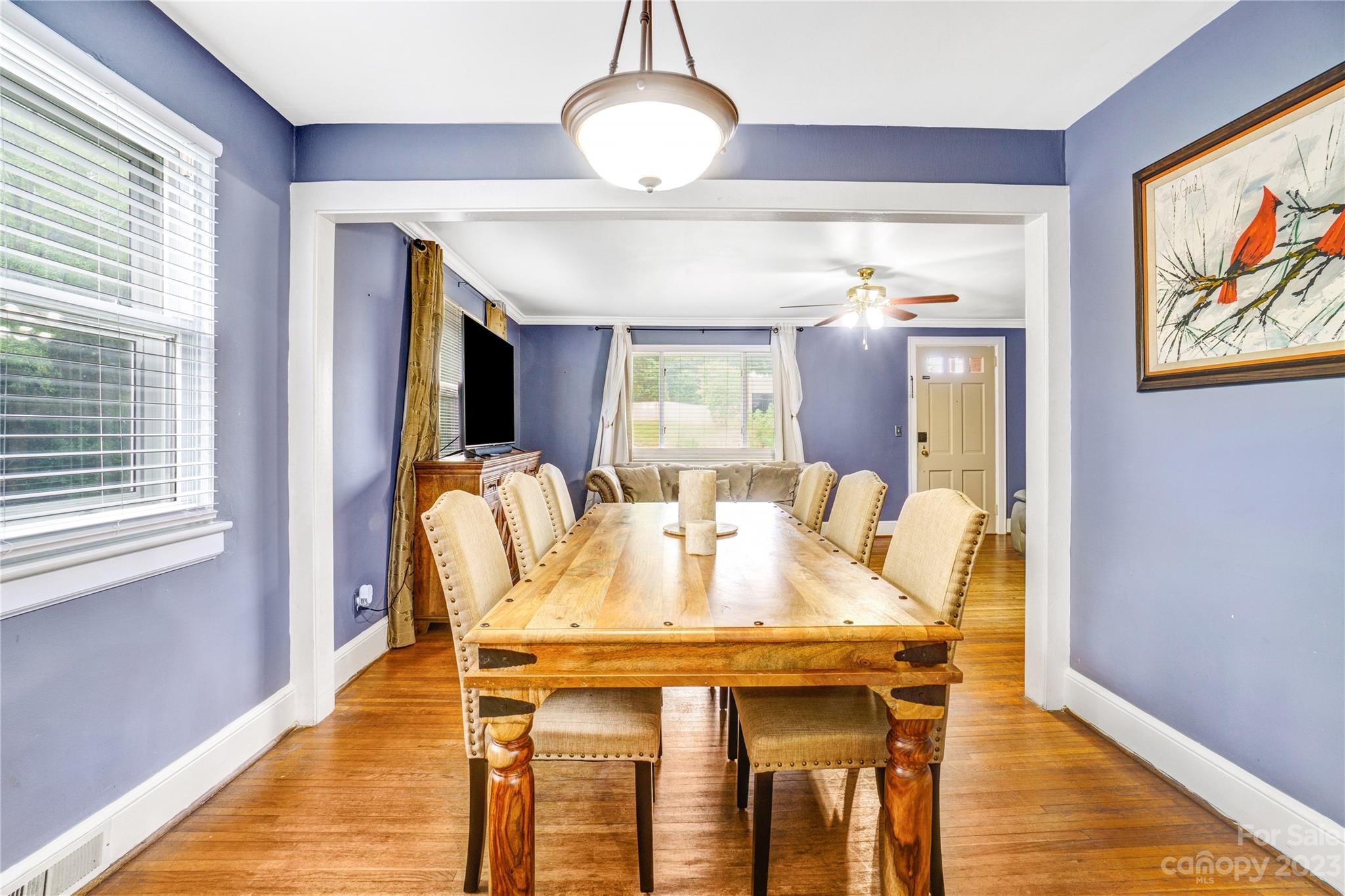 6512 Tuckaseegee Road Charlotte, NC 28214 - Photo 10 of 47 a view of a dining room with furniture window and wooden floor