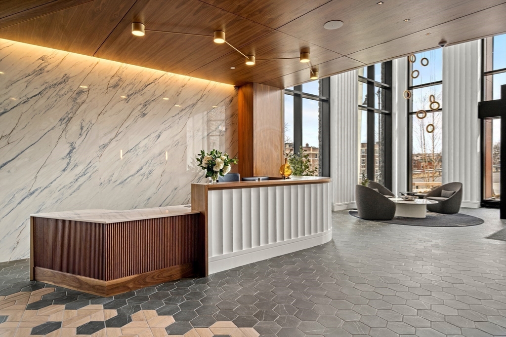 1515 Commonwealth Avenue, Unit 504 Boston, MA 02135 - Photo 18 of 41 a view of a porch with furniture