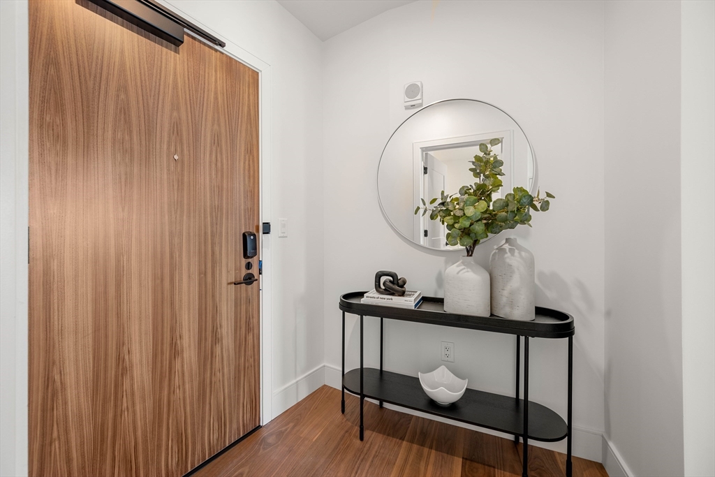 1515 Commonwealth Avenue, Unit 504 Boston, MA 02135 - Photo 2 of 41 a vase of flowers sitting on a table