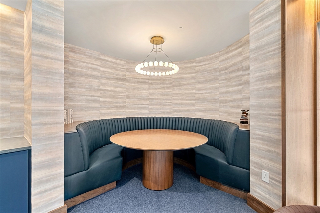 1515 Commonwealth Avenue, Unit 504 Boston, MA 02135 - Photo 28 of 41 a bathroom with a sink and a mirror