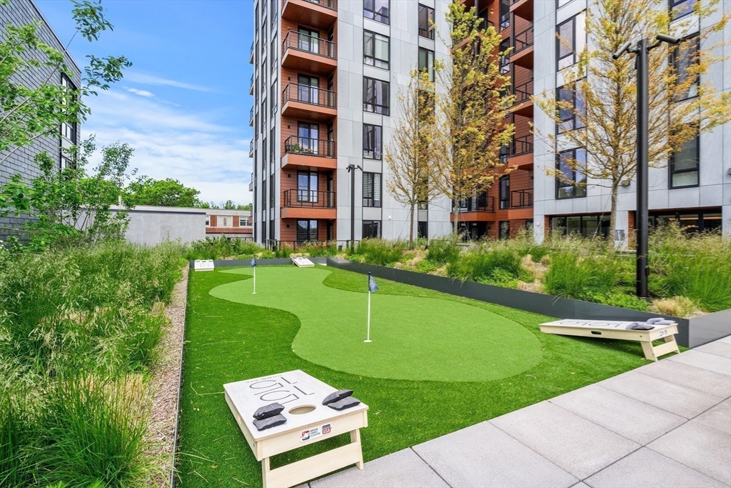 1515 Commonwealth Avenue, Unit 504 Boston, MA 02135 - Photo 35 of 41 a view of a building with garden