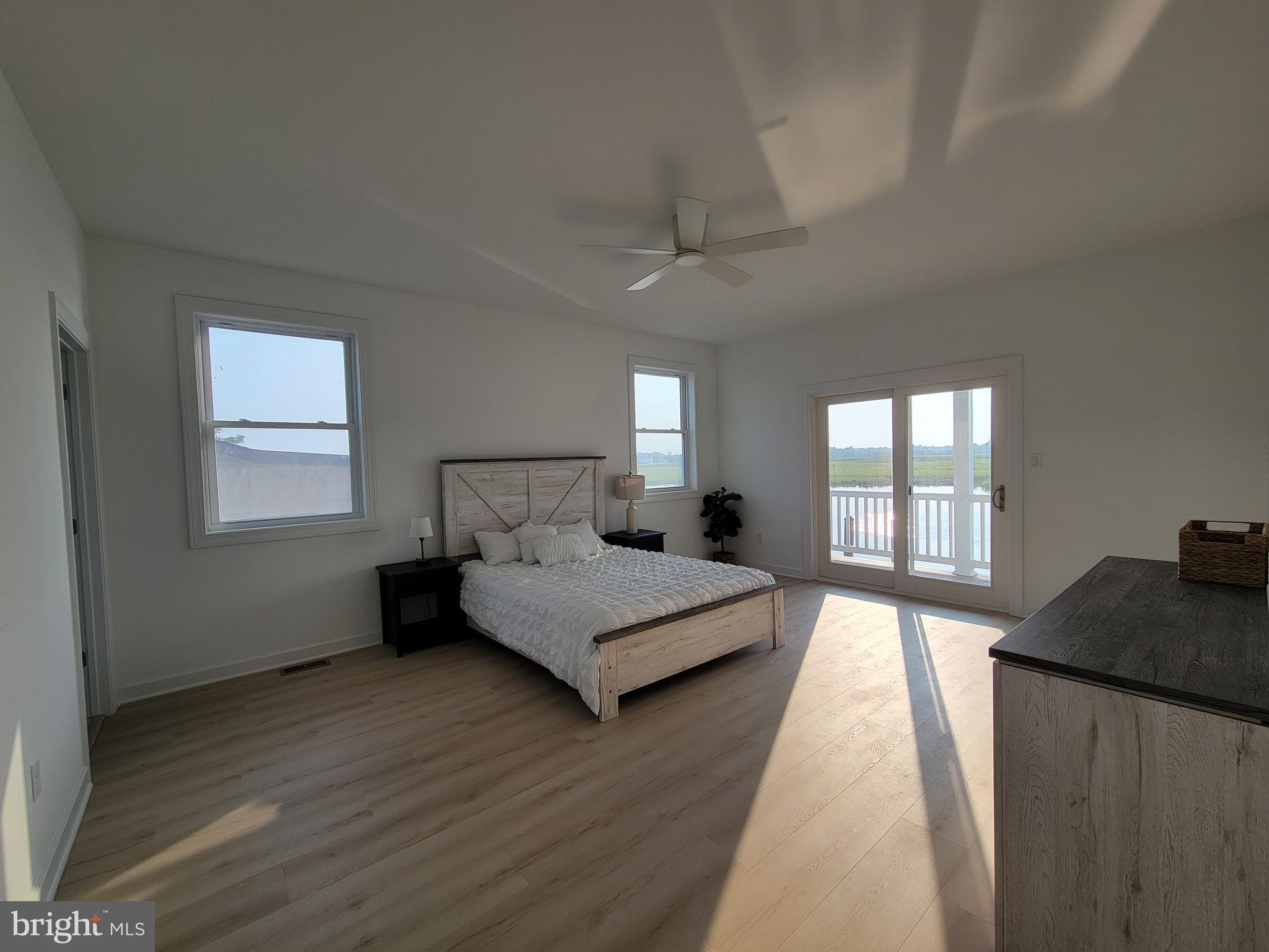 116 Sawyer Road Milford, DE 19963 - Photo 18 of 33 a spacious bedroom with a bed and window