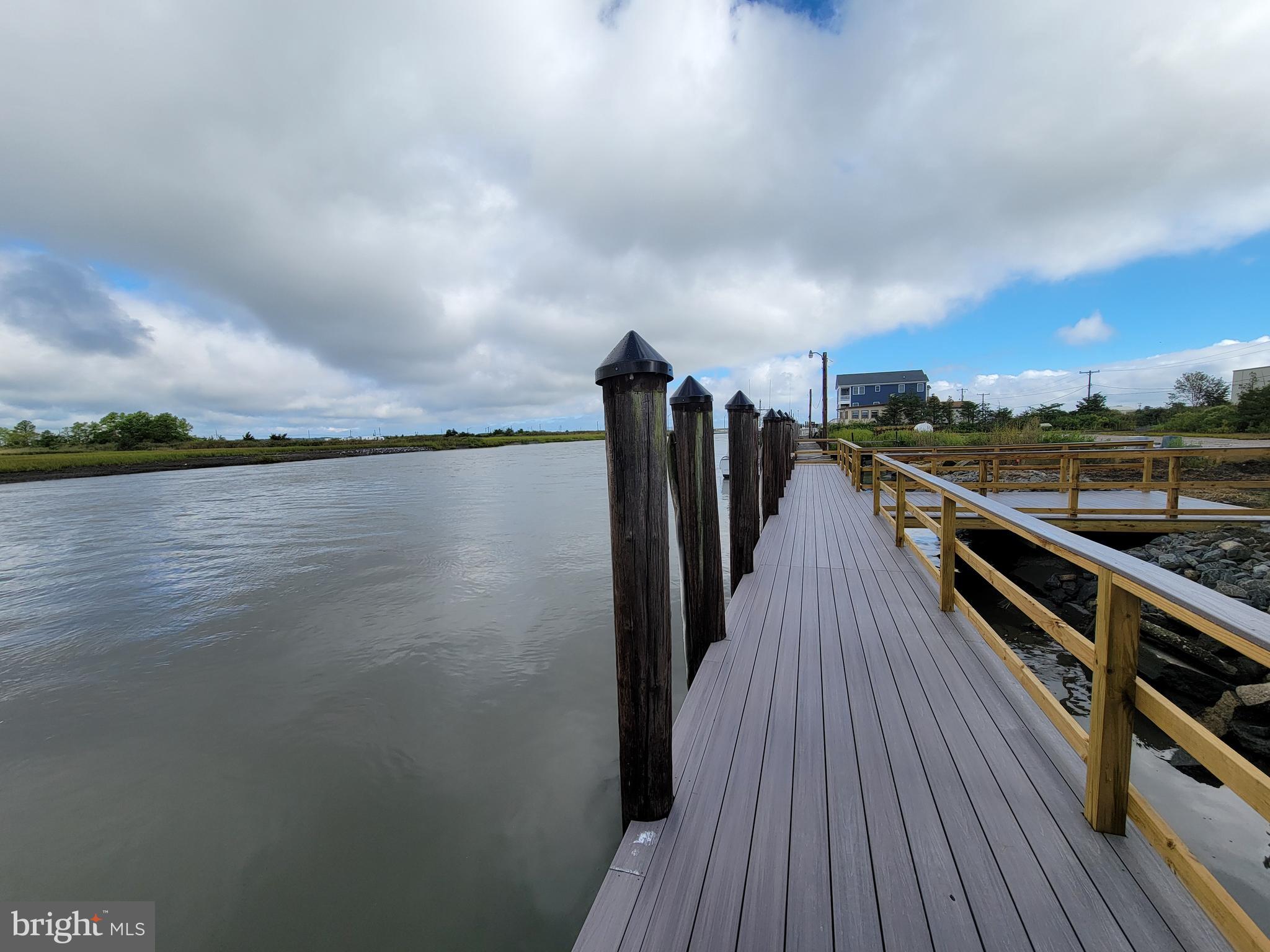 116 Sawyer Road Milford, DE 19963 - Photo 30 of 33 a view of a balcony with wooden floor and city view