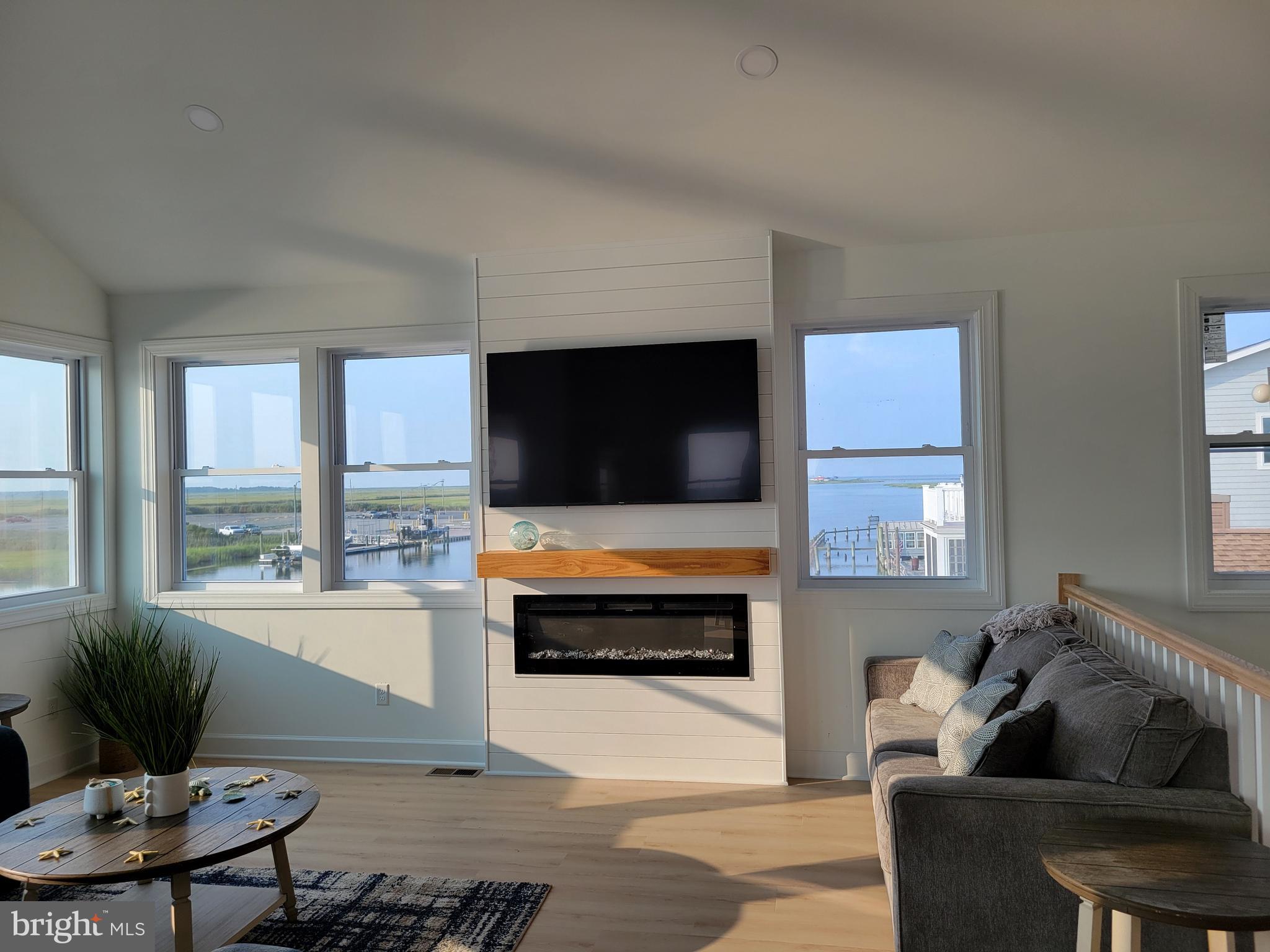 116 Sawyer Road Milford, DE 19963 - Photo 7 of 33 a living room with furniture and a flat screen tv