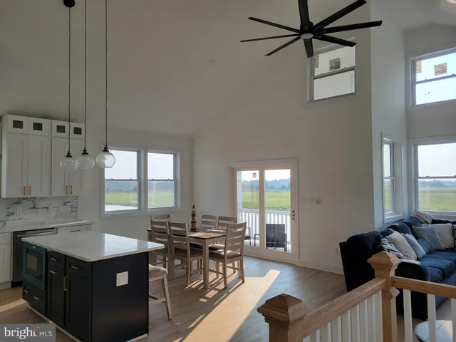a kitchen with counter top space and cabinets