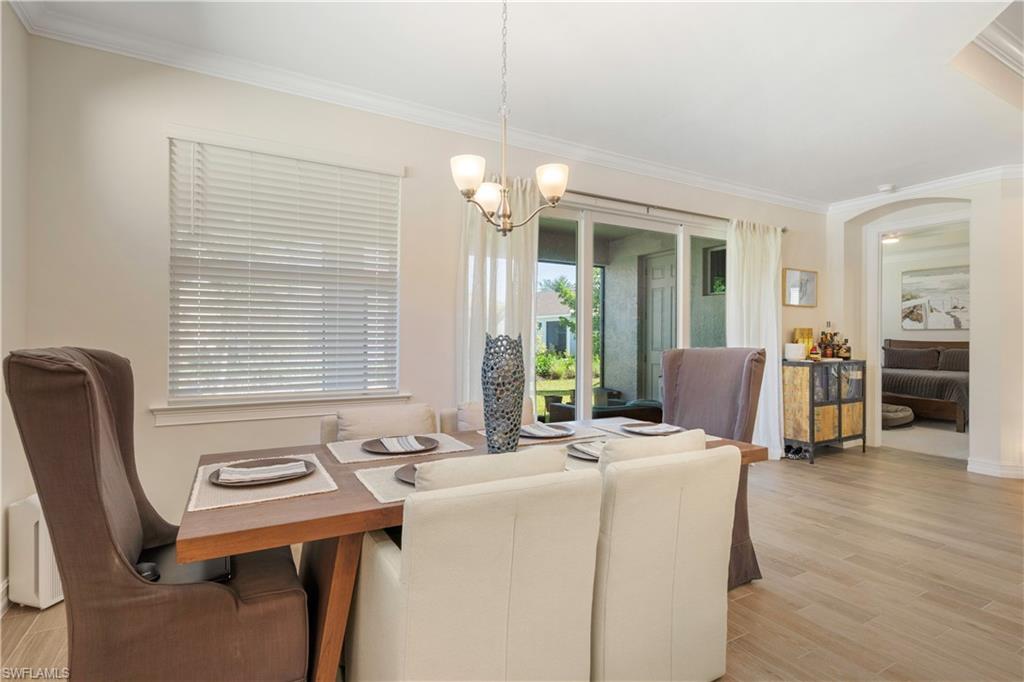 329 Deauville Loop Naples, FL 34114 - Photo 7 of 22 a dining room with furniture and window