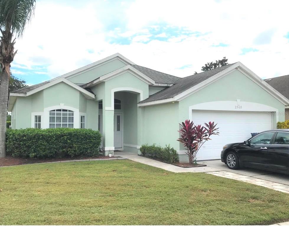 2508 River Ridge Drive Orlando, FL 32825 - Photo 1 of 1 a front view of a house with a yard