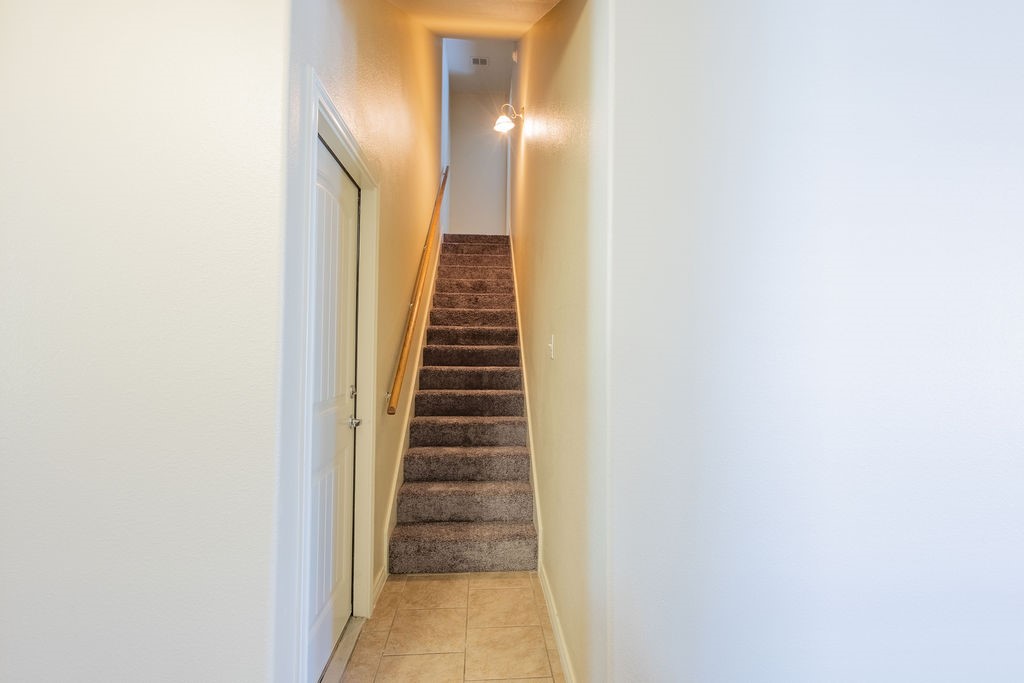 3309 Keefer Loop College Station, TX 77845 - Photo 21 of 27 a view of a hallway with wooden floor