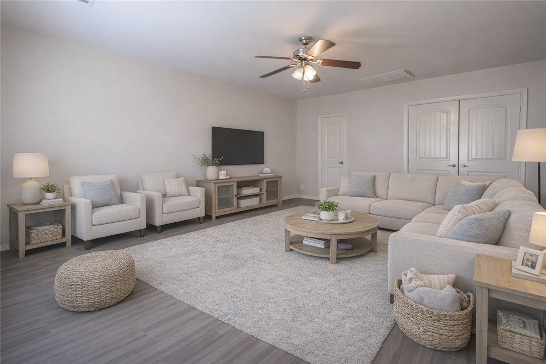 3309 Keefer Loop College Station, TX 77845 - Photo 22 of 27 a living room with furniture and a flat screen tv