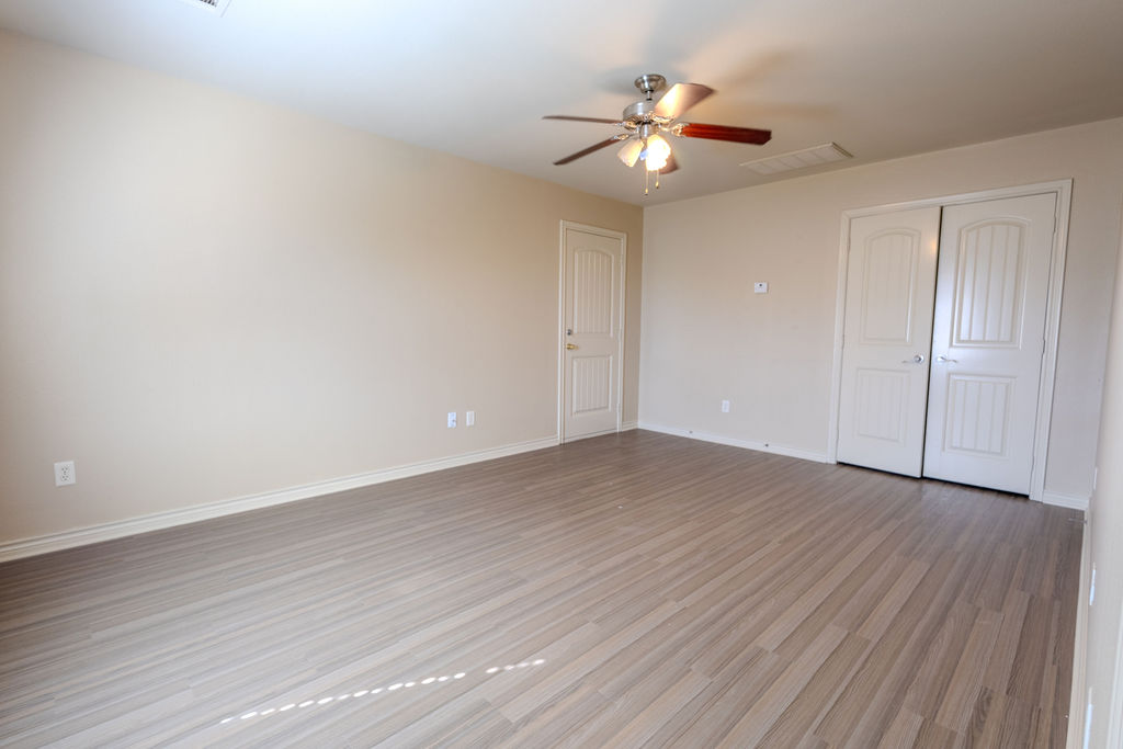 3309 Keefer Loop College Station, TX 77845 - Photo 23 of 27 a view of an empty room with wooden floor