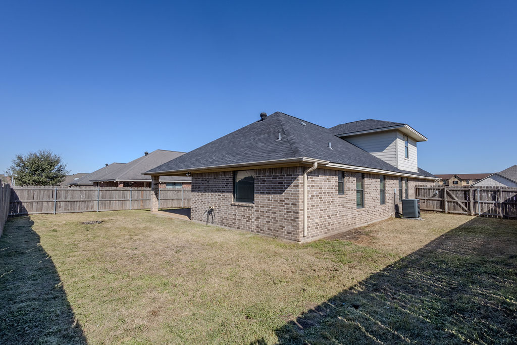 3309 Keefer Loop College Station, TX 77845 - Photo 26 of 27 a view of a house with wooden fence