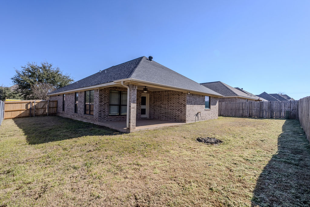 3309 Keefer Loop College Station, TX 77845 - Photo 27 of 27 a front view of a house with a yard